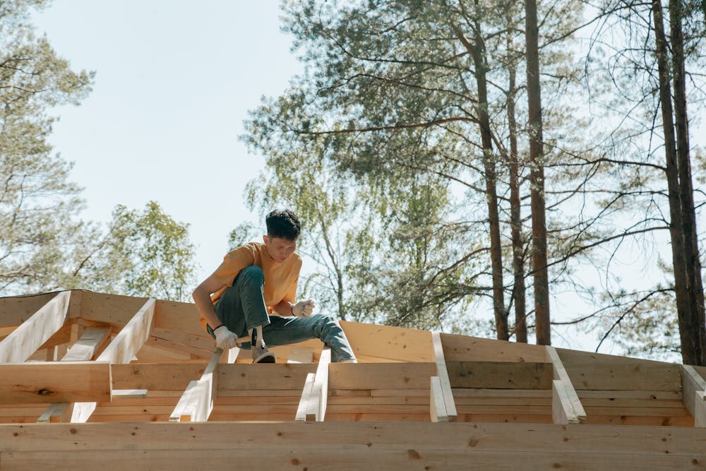 a man working on the roof